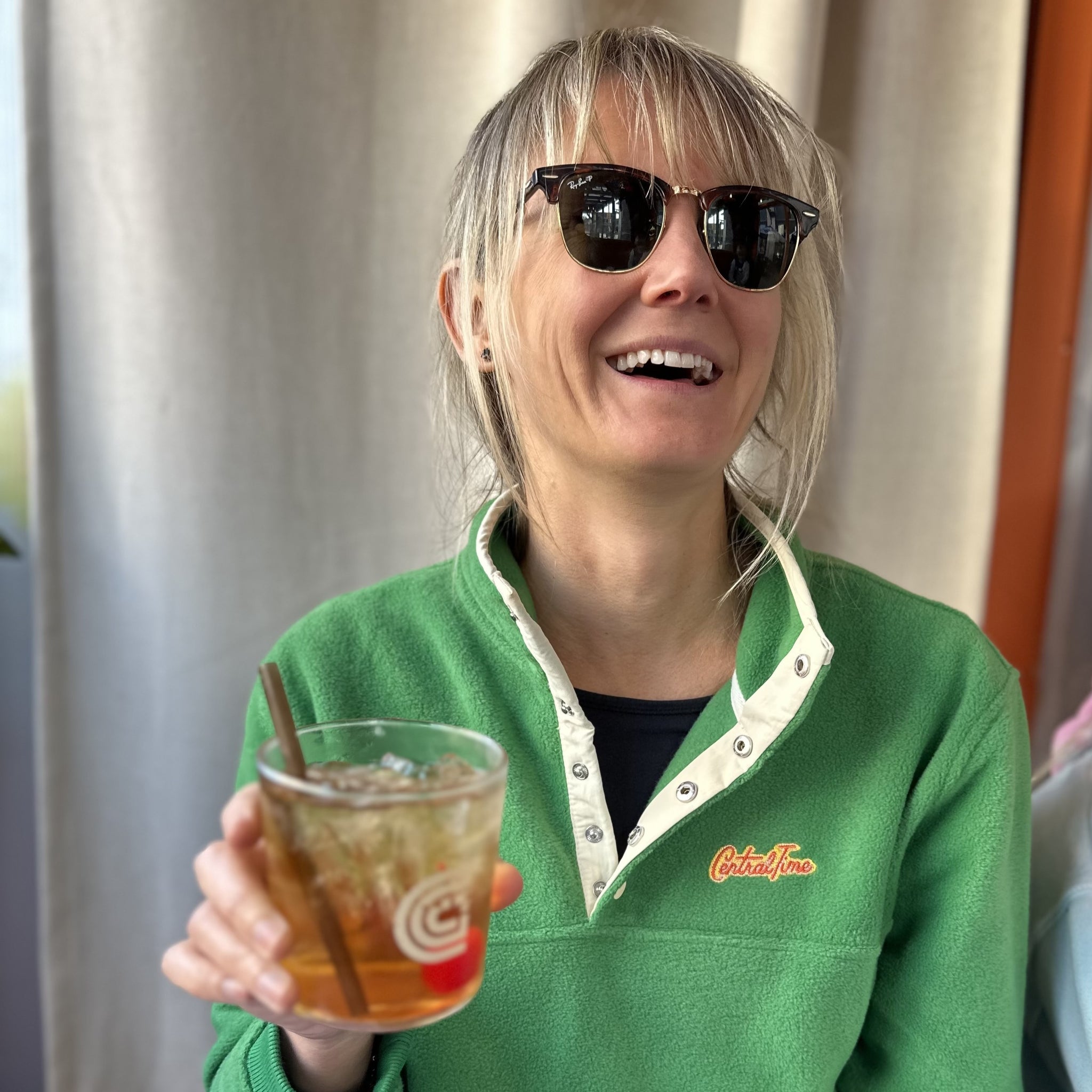 Giltee Central Time micro fleece Kelly Green girl enjoying a old fashioned